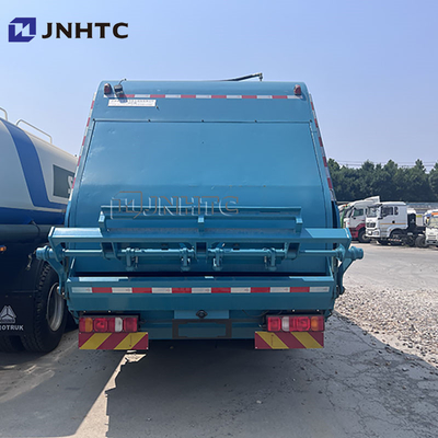 Howo SITRAK 4*2 Cargador trasero Camiones de basura comprimidos Camión de basura