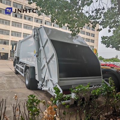 HOWO camión de basura compactador 4x2 Euro 2 eliminación de residuos Cargador trasero de basura camión verde diésel modelo nuevo