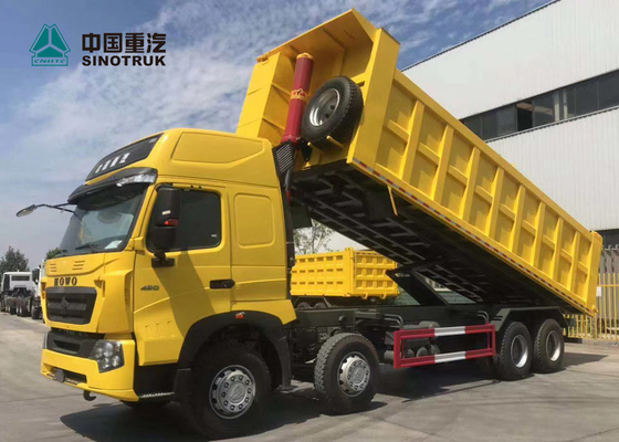 Amarillo del camión volquete de 420HP 8X4 29CBM T7H Sinotruk Howo