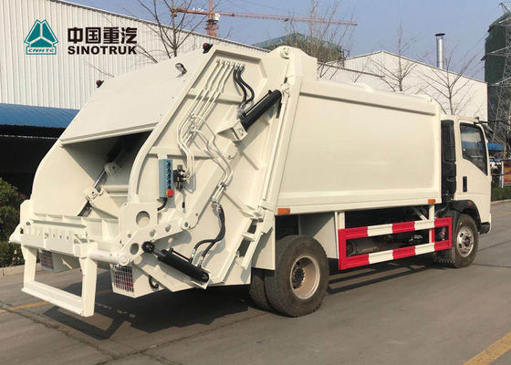 Euro del camión de basura del acuerdo de Sinotruk Howo 4x2 3 120hp 9cbm sin el durmiente