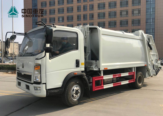Euro del camión de basura del acuerdo de Sinotruk Howo 4x2 3 120hp 9cbm sin el durmiente