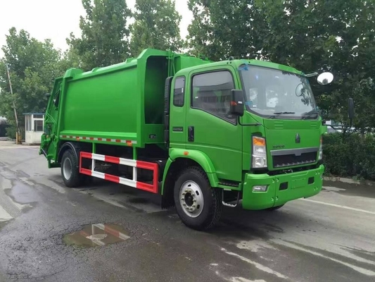 SINOTRUK HOWO 4*2 condensó el camión del compresor de la basura 12m3