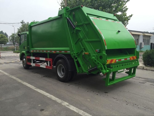 SINOTRUK HOWO 4*2 condensó el camión del compresor de la basura 12m3