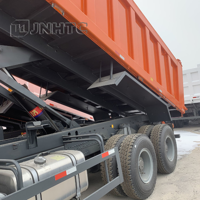 Sinotruk HOWO Euro 2 Mano izquierda Conducción 6x4 371hp Camión blanco de descarga Camión de carga