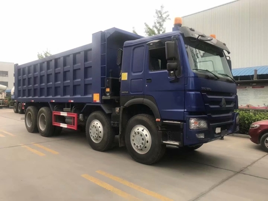 Camión de la caja de la descarga de la forma de SINOTRUK HOWO 8X4 U en Ghana Tanzania Zambia Zimbabwe
