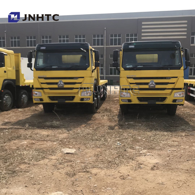 Remolque plano tri Axle Flatbed del cargo de SINOTRUK Howo de los tonos pesados del camión 35