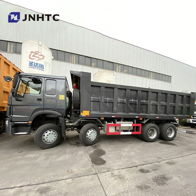 Ruedas resistentes negras 420hp Sinotruk Tipper Truck New Model del camión volquete 12