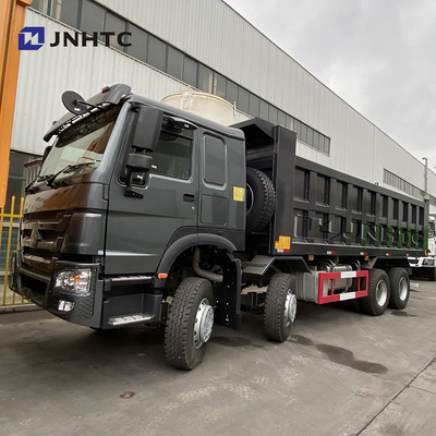 Ruedas resistentes negras 420hp Sinotruk Tipper Truck New Model del camión volquete 12