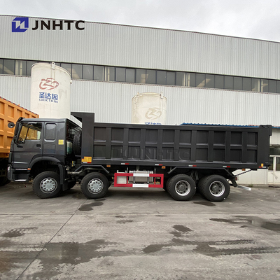 Ruedas resistentes negras 420hp Sinotruk Tipper Truck New Model del camión volquete 12