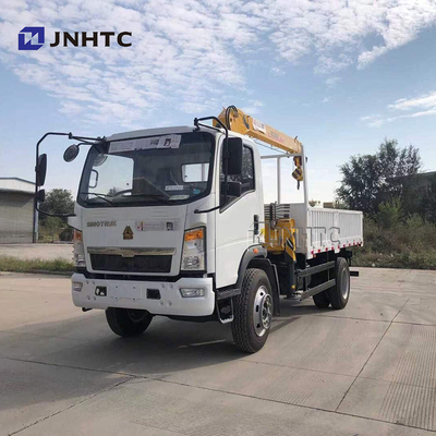 El camión del cargo de la placa plana montó a Crane Sinotruk HOWO 4x4 toda la impulsión de la rueda